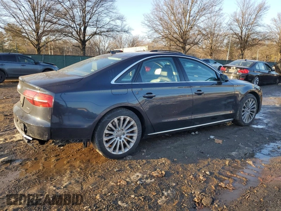 2015 Audi A8 z VIN WAUJGAFD4FN028750, wystawiony jako Copart lot #89099265 z przebiegiem 44 149 mil mil oraz Szkoda całkowita • Salvage title. Historia ofert i sprzedaży dostępna na DreamBid. Obrazek 3.