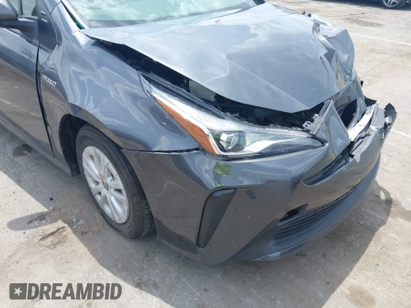2021 Toyota Prius L Eco z VIN JTDKAMFU3M3152785, wystawiony jako IAAI lot #42501351 z przebiegiem 60 489 mil mil oraz . Historia ofert i sprzedaży dostępna na DreamBid. Obrazek 18.