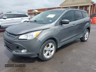 2014 Ford Escape SE with VIN 1FMCU9GX3EUB06947, listed as a IAAI auction lot 42193325 with 138,923 mi miles and . Bid and sale history available at DreamBid. Image 2.