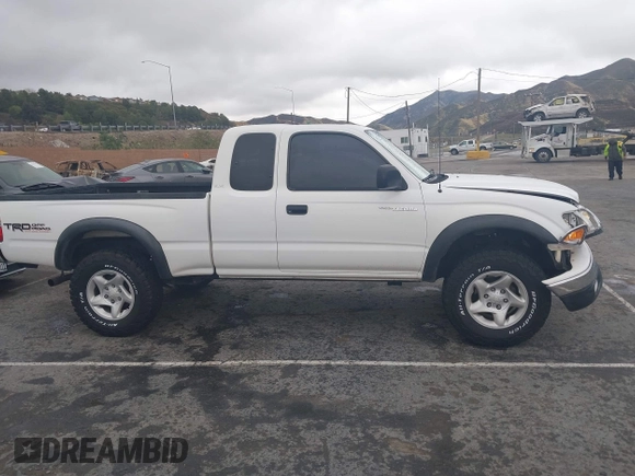 2001 Toyota Tacoma z VIN 5TEWN72N11Z820568, wystawiony jako IAAI lot #41820146 z przebiegiem 188 430 mil mil oraz . Historia ofert i sprzedaży dostępna na DreamBid. Obrazek 12.