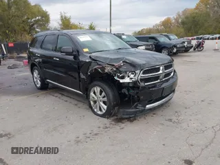 2013 Dodge Durango Crew with VIN 1C4RDHDG8DC592706, listed as a IAAI auction lot 40745114 with 95,757 mi miles. Bid and sale history available at carsss.com. Image 1.