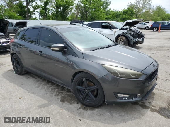 2015 Ford Focus Titanium z VIN 1FADP3N2XFL357224, wystawiony jako Copart lot #55626575 z przebiegiem 159 422 mil mil oraz Szkoda całkowita • Salvage title. Historia ofert i sprzedaży dostępna na DreamBid. Obrazek 4.