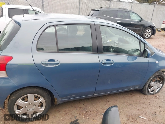 2009 Toyota Yaris with VIN JTDKT903195255240, listed as a IAAI auction lot 41650800 with 168,991 mi miles. Bid and sale history available at carsss.com. Image 13.
