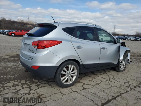 2011 Hyundai Tucson Limited with VIN KM8JUCAC3BU292348, listed as a Copart auction lot 50919925 with 184,505 mi miles and Salvage Title. Bid and sale history available at DreamBid. Image 3.
