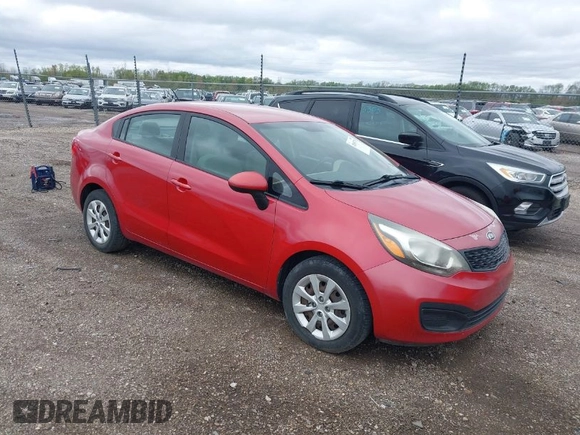 2012 Kia Rio LX with VIN KNADM4A30C6094000, listed as a IAAI auction lot 42059778 with 127,957 mi miles. Bid and sale history available at carsss.com. Image 1.