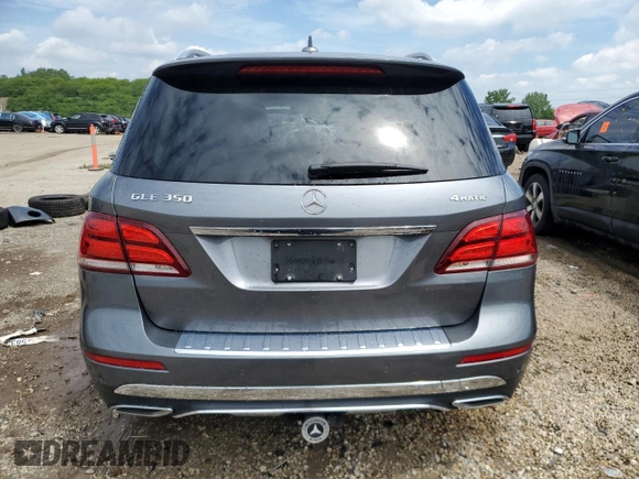 2018 Mercedes-Benz GLE 350 with VIN 4JGDA5HB1JB117315, listed as a Copart auction lot 57871285 with 144,261 mi miles and Salvage title. Bid and sale history available at DreamBid. Image 6.