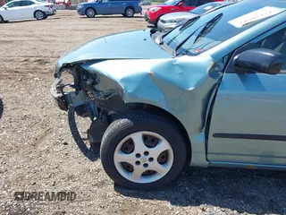 2005 Toyota Corolla CE with VIN 1NXBR32EX5Z373910, listed as a IAAI auction lot 42230582 with 64,004 mi miles and . Bid and sale history available at DreamBid. Image 14.