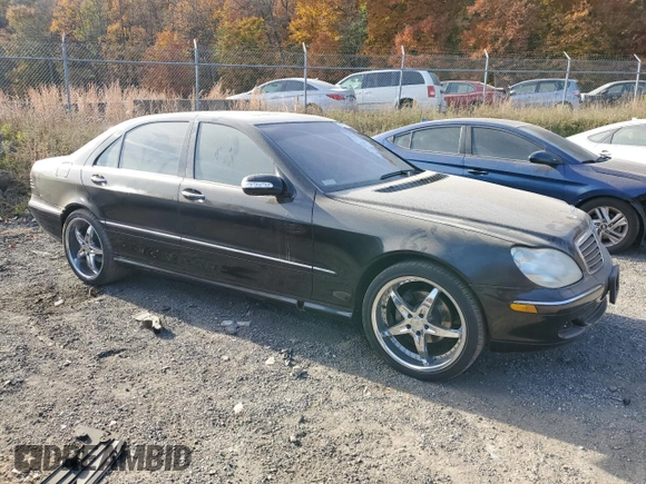 2003 Mercedes-Benz S-Class 5.0L with VIN WDBNG75J13A343070, listed as a Copart auction lot 77412604 with 154,533 mi miles and Salvage Title. Bid and sale history available at carsss.com. Image 4.