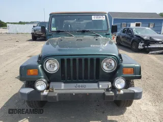 1999 Jeep Wrangler Sahara z VIN 1J4FY49S0XP453920, wystawiony jako Copart lot #61808475 z przebiegiem 129 062 mil mil oraz Czysty tytuł • Clean title. Historia ofert i sprzedaży dostępna na DreamBid. Obrazek 5.
