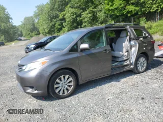 2015 Toyota Sienna LE with VIN 5TDJK3DC0FS112243, listed as a Copart auction lot 61791405 with 86,039 mi miles and Salvage title. Bid and sale history available at DreamBid. Image 1.