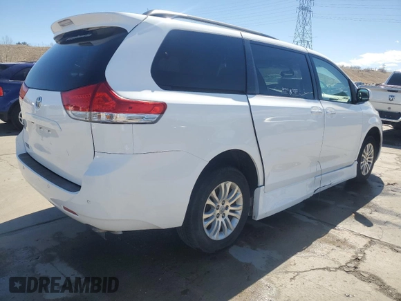 2011 Toyota Sienna XLE AAS with VIN 5TDYK3DC7BS007529, listed as a Copart auction lot 49642475 with 115,117 mi miles and Salvage Title. Bid and sale history available at carsss.com. Image 3.