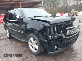 2009 Chevrolet Tahoe LTZ z VIN 1GNFC33J19R282480, wystawiony jako IAAI lot #41536774 z przebiegiem 118 831 mil mil oraz . Historia ofert i sprzedaży dostępna na DreamBid. Obrazek 1.