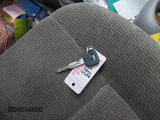 2004 Kia Sedona LX with VIN KNDUP131446493787, listed as a IAAI auction lot 40004348 with 168,374 mi miles. Bid and sale history available at carsss.com. Image 11.