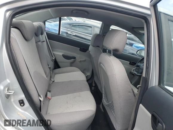 2009 Hyundai Accent Auto GLS z VIN KMHCN46C19U373167, wystawiony jako Copart lot #60026445 z przebiegiem 94 736 mil mil oraz Szkoda całkowita • Salvage title. Historia ofert i sprzedaży dostępna na DreamBid. Obrazek 10.