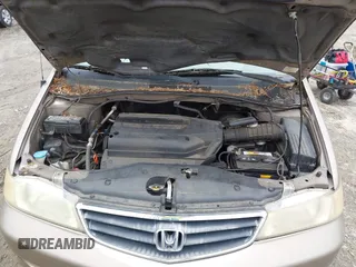 2004 Honda Odyssey EX-L z VIN 5FNRL189X4B036406, wystawiony jako IAAI lot #42368037 z przebiegiem 177 513 mil mil oraz . Historia ofert i sprzedaży dostępna na DreamBid. Obrazek 10.