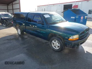 1997 Dodge Dakota with VIN 1B7GL23X8VS124300, listed as a IAAI auction lot 41561541 with 170,248 mi miles. Bid and sale history available at carsss.com. Image 1.