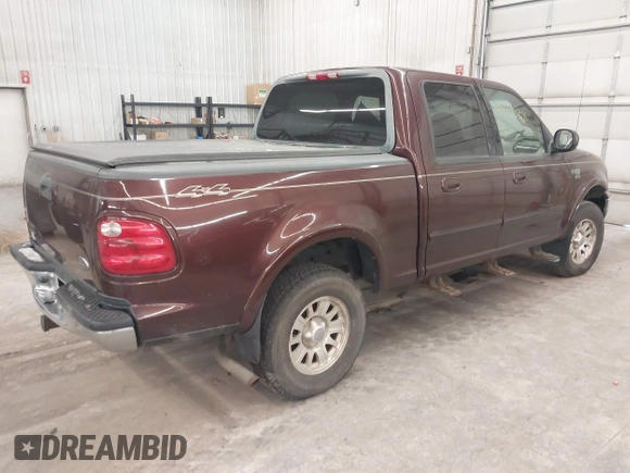 2001 Ford F-150 XLT with VIN 1FTRW08L51KE26356, listed as a IAAI auction lot 41011838 with Not provided miles and . Bid and sale history available at DreamBid. Image 4.