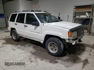 1998 Jeep Grand Cherokee Laredo with VIN 1J4GZ48SXWC183782, listed as a Copart auction lot 41700675 with 226,544 mi miles and Salvage Title. Bid and sale history available at carsss.com. Image 4.
