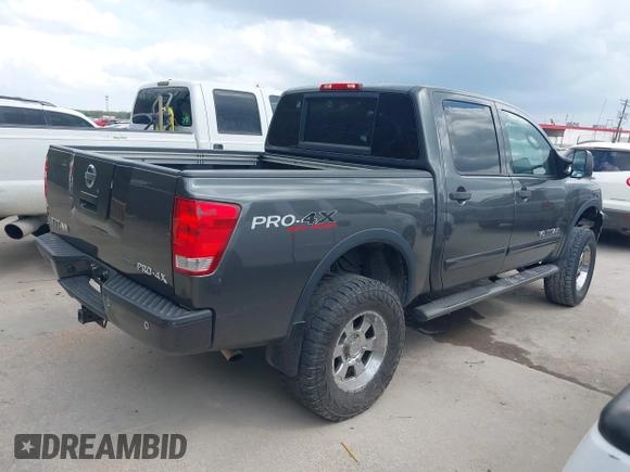 2011 Nissan Titan Pro-4X with VIN 1N6BA0EC3BN320795, listed as a IAAI auction lot 41868113 with 183,919 mi miles and . Bid and sale history available at DreamBid. Image 4.