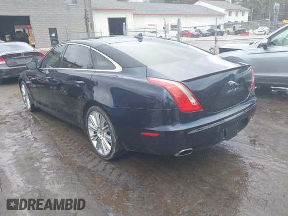2015 Jaguar XJ Portfolio with VIN SAJWJ2GD0F8V83497, listed as a IAAI auction lot 41697285 with 52,311 mi miles and . Bid and sale history available at DreamBid. Image 3.