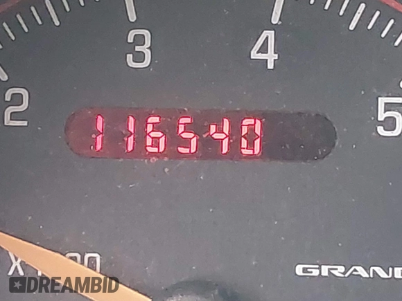 2004 Pontiac Grand Am SE z VIN 1G2NE52F94M530881, wystawiony jako IAAI lot #41648302 z przebiegiem 116 540 mil mil oraz . Historia ofert i sprzedaży dostępna na DreamBid. Obrazek 16.