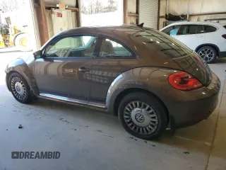 2014 Volkswagen Beetle 2.5L w/Sun with VIN 3VWJP7AT0EM632824, listed as a Copart auction lot 87279494 with Not Provided miles and Salvage Title. Bid and sale history available at DreamBid. Image 2.