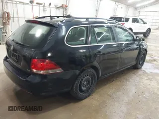 2014 Volkswagen Jetta SportWagen TDI w/Sunroof & Nav with VIN 3VWPL7AJ2EM626110, listed as a IAAI auction lot 42093622 with 115,691 mi miles. Bid and sale history available at carsss.com. Image 4.