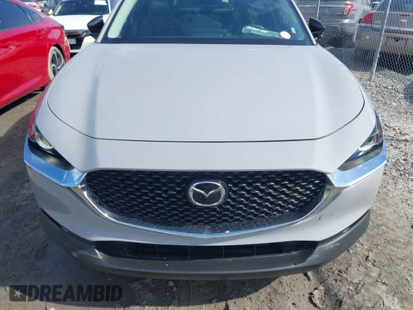 2025 Mazda CX-30 S Select Sport z VIN 3MVDMBBM8SM758071, wystawiony jako IAAI lot #42007849 z przebiegiem 8 678 mil mil oraz . Historia ofert i sprzedaży dostępna na DreamBid. Obrazek 12.