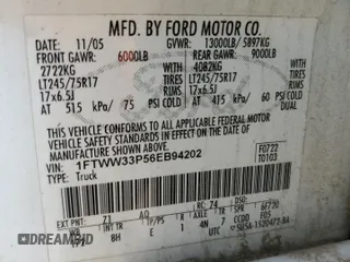 2006 Ford F-350 XL with VIN 1FTWW33P56EB94202, listed as a Copart auction lot 65182534 with 125,141 mi miles and Salvage title. Bid and sale history available at DreamBid. Image 12.