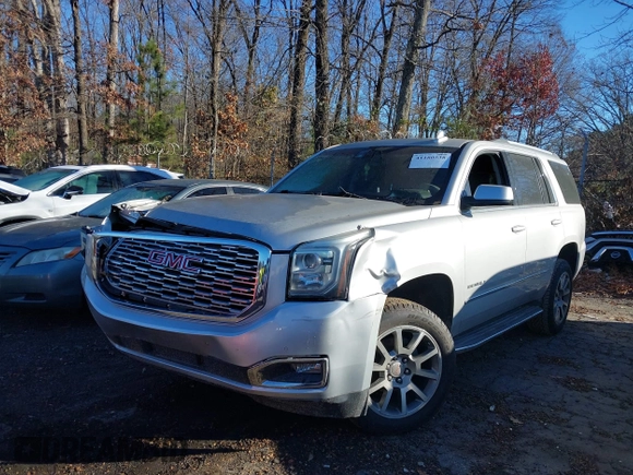 2018 GMC Yukon Denali with VIN 1GKS1CKJ9JR241330, listed as a IAAI auction lot 41180538 with 100,300 mi miles. Bid and sale history available at carsss.com. Image 2.