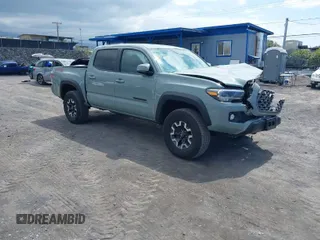 2023 Toyota Tacoma 4WD SR with VIN 3TYCZ5AN7PT145185, listed as a IAAI auction lot 41658297 with 23,647 mi miles. Bid and sale history available at carsss.com. Image 1.