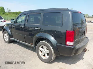 2008 Dodge Nitro SXT z VIN 1D8GU28K08W151127, wystawiony jako IAAI lot #42502070 z przebiegiem 145 972 mil mil oraz . Historia ofert i sprzedaży dostępna na DreamBid. Obrazek 3.