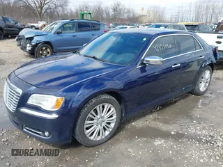 2014 Chrysler 300 C with VIN 2C3CCAKG2EH273209, listed as a IAAI auction lot 41955858 with 112,742 mi miles and . Bid and sale history available at carsss.com. Image 2.