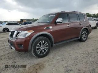 2017 Nissan Armada SL with VIN JN8AY2NDXH9008199, listed as a Copart auction lot 50427455 with 170,542 mi miles and Salvage Title. Bid and sale history available at carsss.com. Image 1.