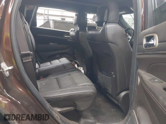 2014 Jeep Grand Cherokee Summit with VIN 1C4RJFJT6EC346575, listed as a IAAI auction lot 41881795 with 148,941 mi miles and . Bid and sale history available at DreamBid. Image 8.