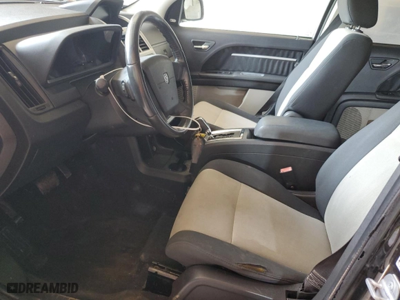 2009 Dodge Journey SXT with VIN 3D4GG57V99T578867, listed as a Copart auction lot 52327205 with 190,012 mi miles and Clean Title. Bid and sale history available at carsss.com. Image 7.