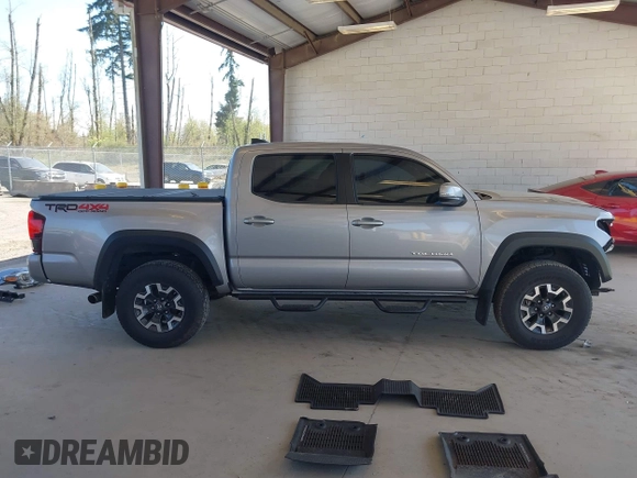 2018 Toyota Tacoma SR with VIN 3TMCZ5ANXJM146284, listed as a IAAI auction lot 42041525 with 103,143 mi miles and . Bid and sale history available at DreamBid. Image 14.