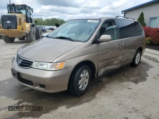 2004 Honda Odyssey EX-RES z VIN 5FNRL18854B148893, wystawiony jako Copart lot #51949835 z przebiegiem 165 775 mil mil oraz Nie do naprawy • Non repairable. Historia ofert i sprzedaży dostępna na DreamBid. Obrazek 1.