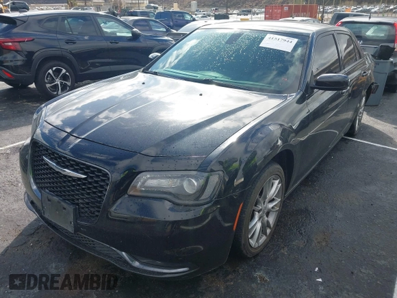 2018 Chrysler 300 with VIN 2C3CCABGXJH239934, listed as a IAAI auction lot 41517944 with 140,699 mi miles. Bid and sale history available at carsss.com. Image 2.
