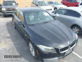2014 BMW 5 Series 535i with VIN WBA5B1C54ED476763, listed as a IAAI auction lot 41590236 with 115,048 mi miles and . Bid and sale history available at DreamBid. Image 6.