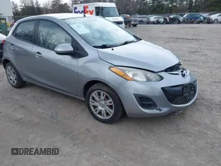 2013 Mazda Mazda2 Sport with VIN JM1DE1KY5D0159551, listed as a IAAI auction lot 41903043 with 107,858 mi miles. Bid and sale history available at carsss.com. Image 1.