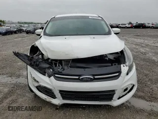 2013 Ford Escape SE with VIN 1FMCU9GX7DUA24721, listed as a Copart auction lot 54543385 with 203,036 mi miles and Salvage title. Bid and sale history available at DreamBid. Image 5.