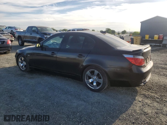 2005 BMW 5 Series 545i with VIN WBANB33565CN65980, listed as a Copart auction lot 52961975 with 143,772 mi miles and Salvage Title. Bid and sale history available at carsss.com. Image 2.