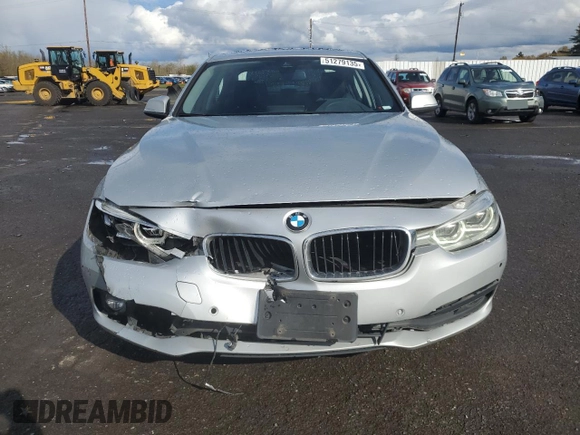 2018 BMW 3 Series 320i with VIN WBA8A9C57JAD27972, listed as a Copart auction lot 51279135 with 64,444 mi miles and Salvage title. Bid and sale history available at DreamBid. Image 5.