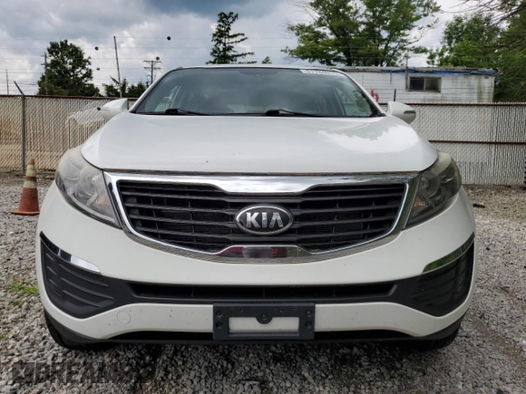 2013 Kia Sportage LX with VIN KNDPBCA20D7501980, listed as a Copart auction lot 61784015 with 140,793 mi miles and Salvage title. Bid and sale history available at DreamBid. Image 5.