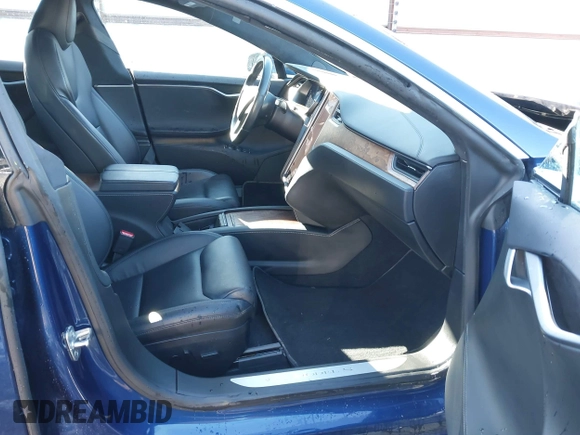2020 Tesla Model S Long Range with VIN 5YJSA1E26LF410779, listed as a IAAI auction lot 41241192 with 68,764 mi miles and . Bid and sale history available at DreamBid. Image 5.
