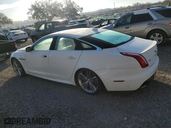2016 Jaguar XJ with VIN SAJWA1CE4GMV91734, listed as a Copart auction lot 81005144 with 31,924 mi miles and Salvage Title. Bid and sale history available at DreamBid. Image 2.