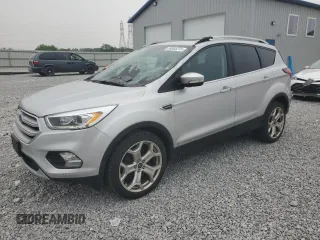 2019 Ford Escape Titanium с VIN 1FMCU9J90KUA07976, выставлен на аукционе Copart как лот 59565275 с пробегом 189 655 миль миль и Списание • Salvage title. История ставок и продаж доступна на DreamBid. Изображение 1.