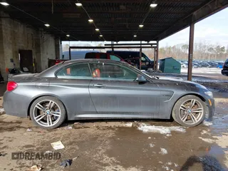 2017 BMW M4 with VIN WBS3U9C55HP970922, listed as a IAAI auction lot 41405271 with 61,953 mi miles. Bid and sale history available at carsss.com. Image 13.