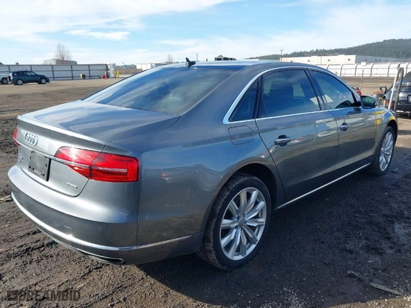 2016 Audi A8 L 3.0T with VIN WAU34AFD0GN005520, listed as a IAAI auction lot 41689248 with 76,150 mi miles. Bid and sale history available at carsss.com. Image 4.